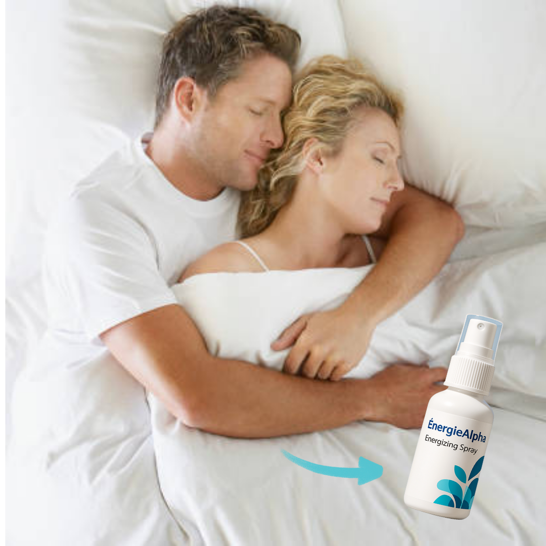 Confident energised man holding ÉnergieAlpha spray bottle